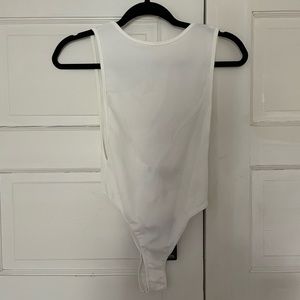 NWT pretty little things thong body suit